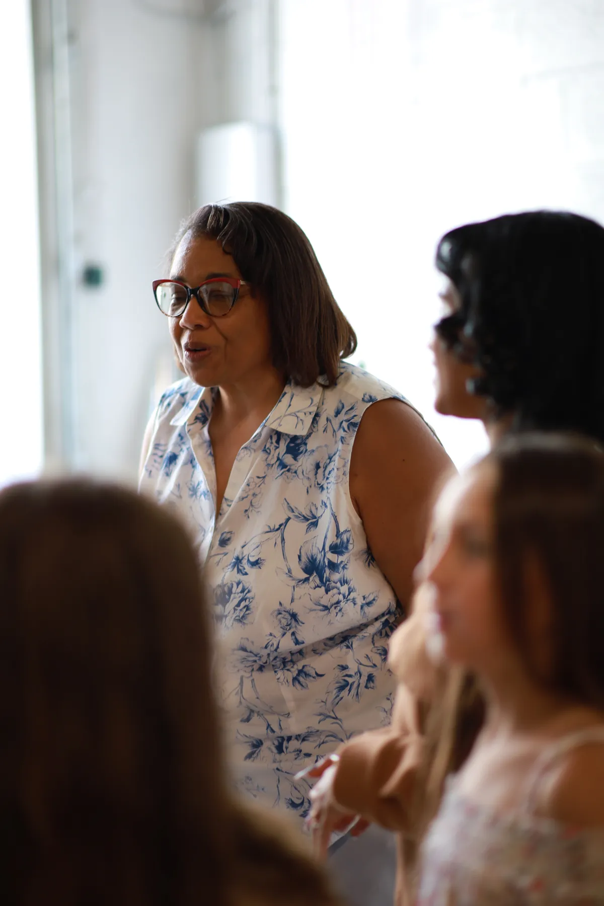 A woman sharing with the group