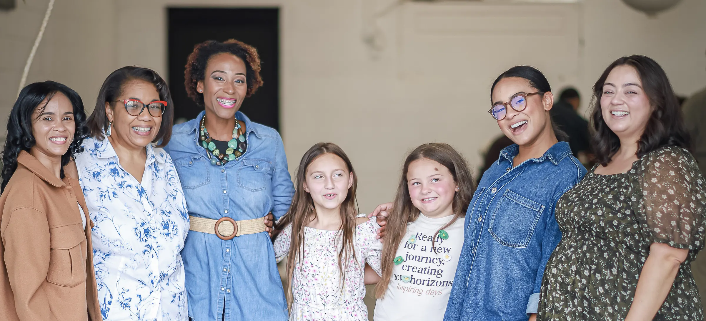 The women of Garden Co. arm in arm
